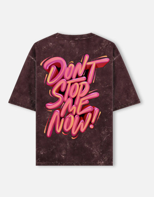 T-shirt with 'Don't Stop Me Now' text in pink on a white background