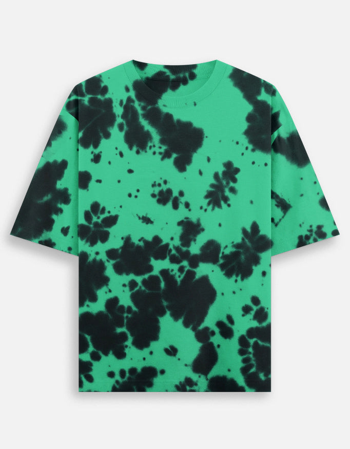 Green and black tie-dye t-shirt on a white background