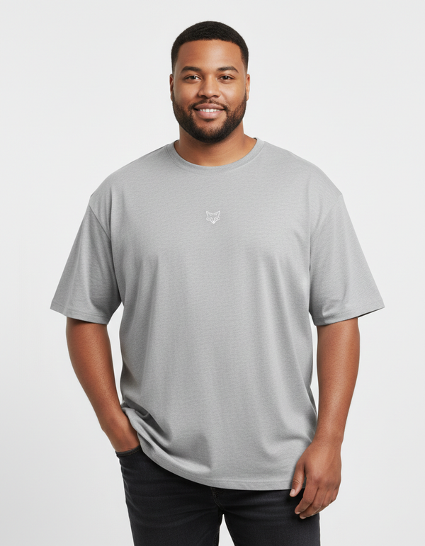 Man wearing a gray t-shirt with a  TinyFox logo on a white background