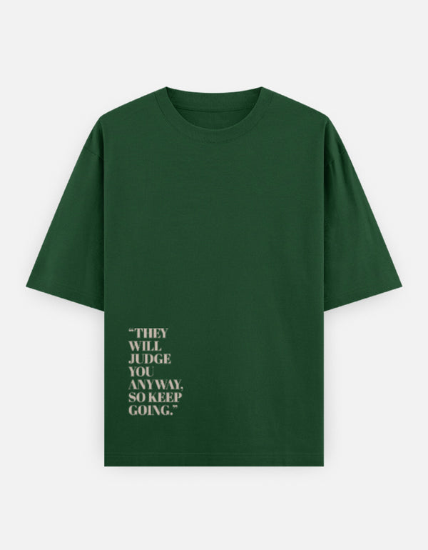 Green t-shirt with motivational quote on a white background