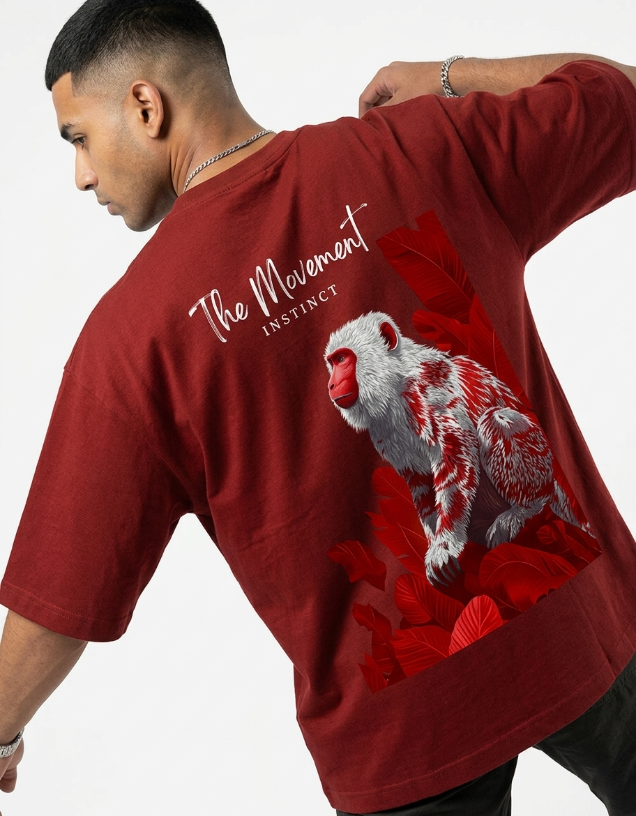 Man wearing a red t-shirt with a graphic design on the back